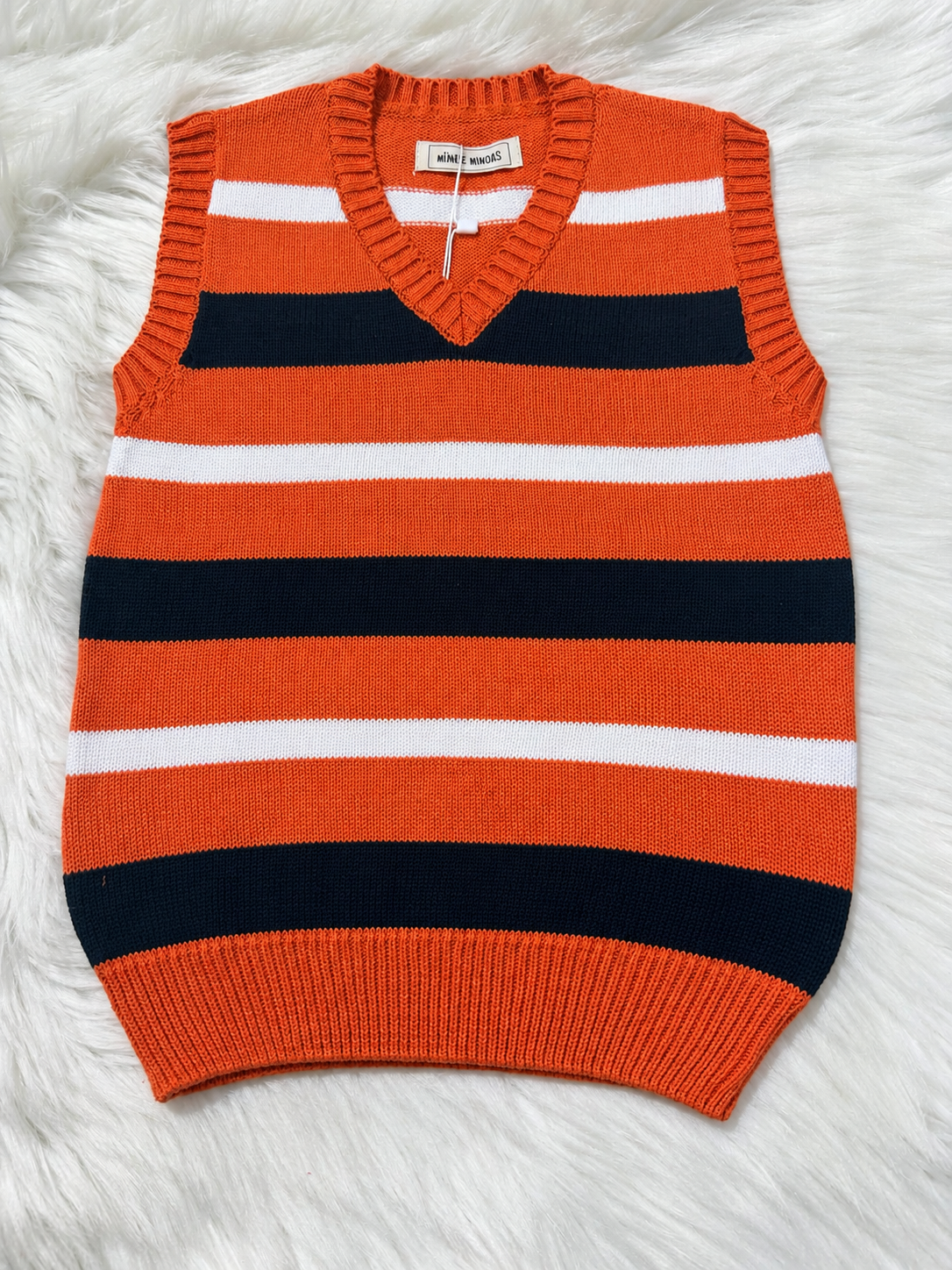 MM orange  sleeves less sweater